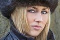 Beautiful Blond Woman With Blue Eyes in Fur Hat Royalty Free Stock Photo