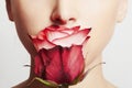 Beautiful blond woman face and flower.girl and rose.skin care Royalty Free Stock Photo