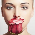 Beautiful blond woman with flower.girl and rose Royalty Free Stock Photo