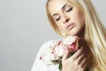 Beautiful Blond Woman with Flowers.Whiteroses Royalty Free Stock Photo