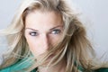 Beautiful blond woman giving an assessing look Royalty Free Stock Photo