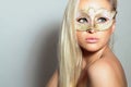 Beautiful Blond Woman in Gold Mask.Masquerade. Girl. Beauty & Fashion Royalty Free Stock Photo