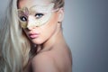 Beautiful Blond Woman in a Golden Mask.Masquerade. Girl Royalty Free Stock Photo