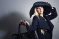 Beautiful Blond Woman in Hat.Shopping with Handbag Royalty Free Stock Photo