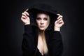 beautiful blond woman in hood. pretty girl with smokey eyes Royalty Free Stock Photo