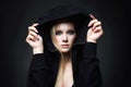 Beautiful blond woman in hood. pretty girl with smokey eyes Royalty Free Stock Photo