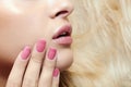 Beautiful blond woman.lips,nails and hair