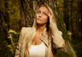 Beautiful blond woman portrait in the forest with birch tree Royalty Free Stock Photo