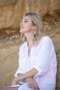 Beautiful young emotional blondie woman portrait in white blouse Royalty Free Stock Photo