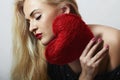 Beautiful Blond Woman with Red Heart. Beauty Girl. Show Love Symbol. Valentines Day Royalty Free Stock Photo