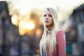 Beautiful blond woman in the street on sunset Royalty Free Stock Photo