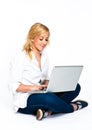 Beautiful Blond Woman typing on laptop Royalty Free Stock Photo