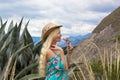 Beautiful blond woman wearing the hat outdoors in the prairie Royalty Free Stock Photo