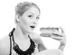 Beautiful blond young woman eating chocolate cake Royalty Free Stock Photo