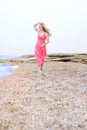 Beautiful blonde ashore epidemic deathes in rose gown Royalty Free Stock Photo