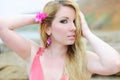 Beautiful blonde ashore epidemic deathes in rose gown Royalty Free Stock Photo