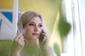 Beautiful blonde bride waiting her groom in wedding day Royalty Free Stock Photo