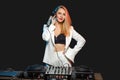 Beautiful blonde DJ girl on decks - the party Royalty Free Stock Photo