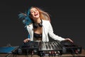 Beautiful blonde DJ girl on decks - the party