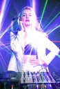 Beautiful blonde DJ girl on decks - the party, Royalty Free Stock Photo