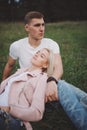 Beautiful blonde girl with boyfriend Royalty Free Stock Photo