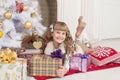 Girl, Christmas tree, gifts and toys Royalty Free Stock Photo