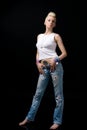 Beautiful blonde girl in jeans Royalty Free Stock Photo