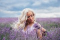 Beautiful blonde girl in lavender Royalty Free Stock Photo