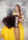 The girl with the accordion Royalty Free Stock Photo
