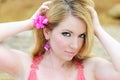 Beautiful blonde in rose gown Royalty Free Stock Photo