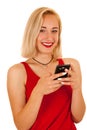 beautiful blonde teenage girl texting on smart phone isolated over white Royalty Free Stock Photo