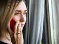 Beautiful blonde thoughtful businesswoman talk cellphone Royalty Free Stock Photo