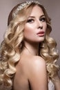 Beautiful blonde in a wedding image with curls Royalty Free Stock Photo