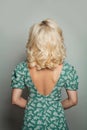 Beautiful blonde woman back with perfect curly long bob haircut Royalty Free Stock Photo