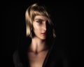 Beautiful Blonde Woman in Chiaroscuro Style Light Royalty Free Stock Photo