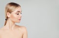 Beautiful blonde woman face, female profile on white background. Facial treatment, skin care and cosmetology concept