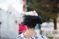 Beautiful blonde woman with flower wreath on her head. Beautiful girl with flowers hairstyle. Fashion photo Royalty Free Stock Photo