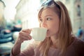 Beautiful blonde woman having breakfast at the bar Royalty Free Stock Photo