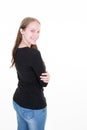 Beautiful blonde woman long hair back view crossed arms and buttock in jeans Royalty Free Stock Photo