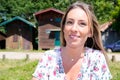 Beautiful blonde woman outdoor against fisherman wooden hut in Arcachon bay France