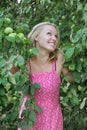 Beautiful blonde woman in pink dress Royalty Free Stock Photo