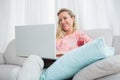 Beautiful blonde woman using laptop Royalty Free Stock Photo