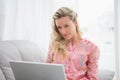 Beautiful blonde woman using laptop Royalty Free Stock Photo