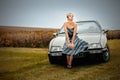 Ternopil, Ukraine - October 15, 2017: Citroen CX 2000, 80th, france classic car and beautiful blonde woman french style dressed Royalty Free Stock Photo