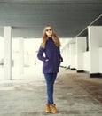 Beautiful blonde woman wearing a jacket and sunglasses Royalty Free Stock Photo