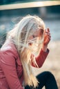 Beautiful blonde woman with wind in hair. Emotional art portrait Royalty Free Stock Photo
