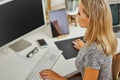 Beautiful blonde woman working on the computer Royalty Free Stock Photo