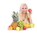 Beautiful blonde young woman with fruits,