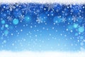 Beautiful blue blurred Christmas and Winter snow sky bokeh background with crystal snowflakes