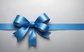beautiful blue bow ribbon on gray background, space for text Royalty Free Stock Photo